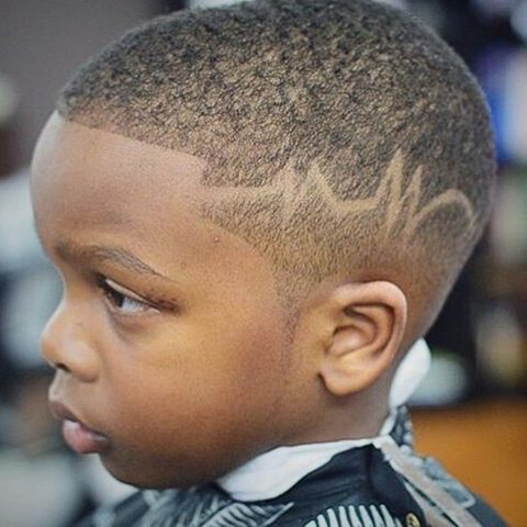 Kids fade with hair design side profile